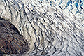 Ice versus Rock, A glacier flowing around a rock outcrop